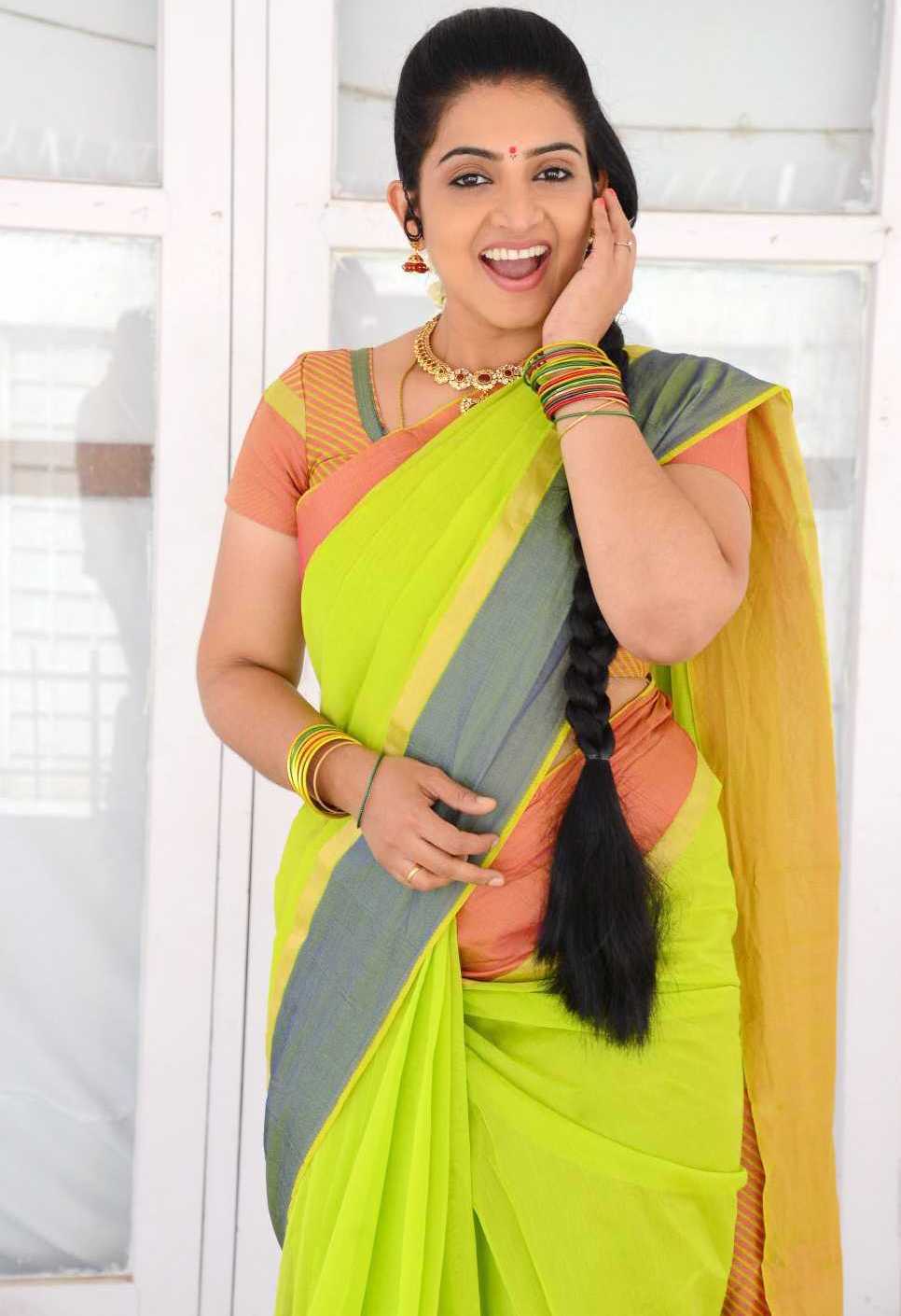 TELUGU TV ACTRESS SUJITHA PHOTOS IN YELLOW SAREE 5